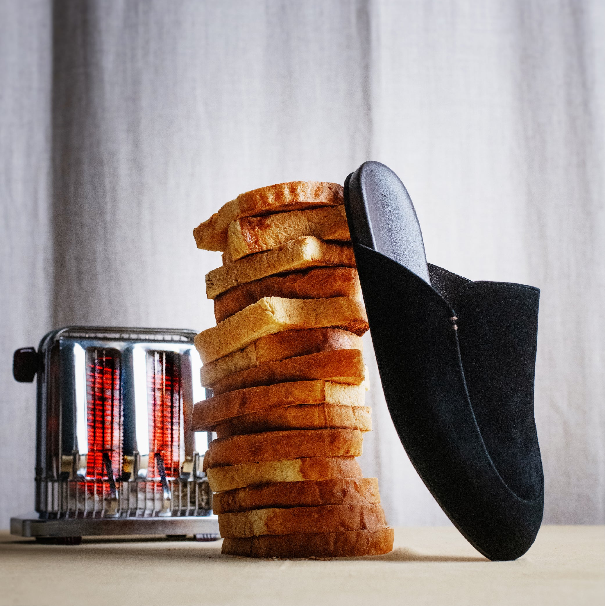 Men's black suede slippers still life picture